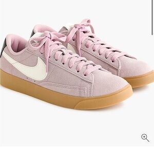 Nike Pink and White Sneakers with Classic Design